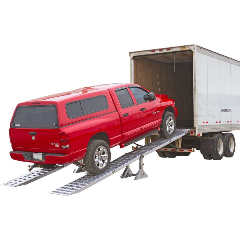 Red truck driving up HD Ramps Modular Aluminum Trailer Ramp. HD-05-20-240-02-06M-HIGH-REV1
